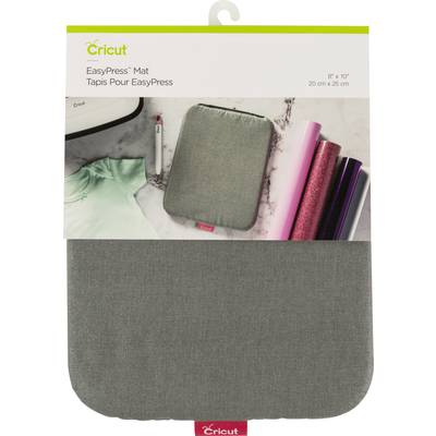 Packaging of the Cricut EasyPress Mat, size 20 cm x 25 cm, shown with a grey mat, vinyl sheets and a green t-shirt.