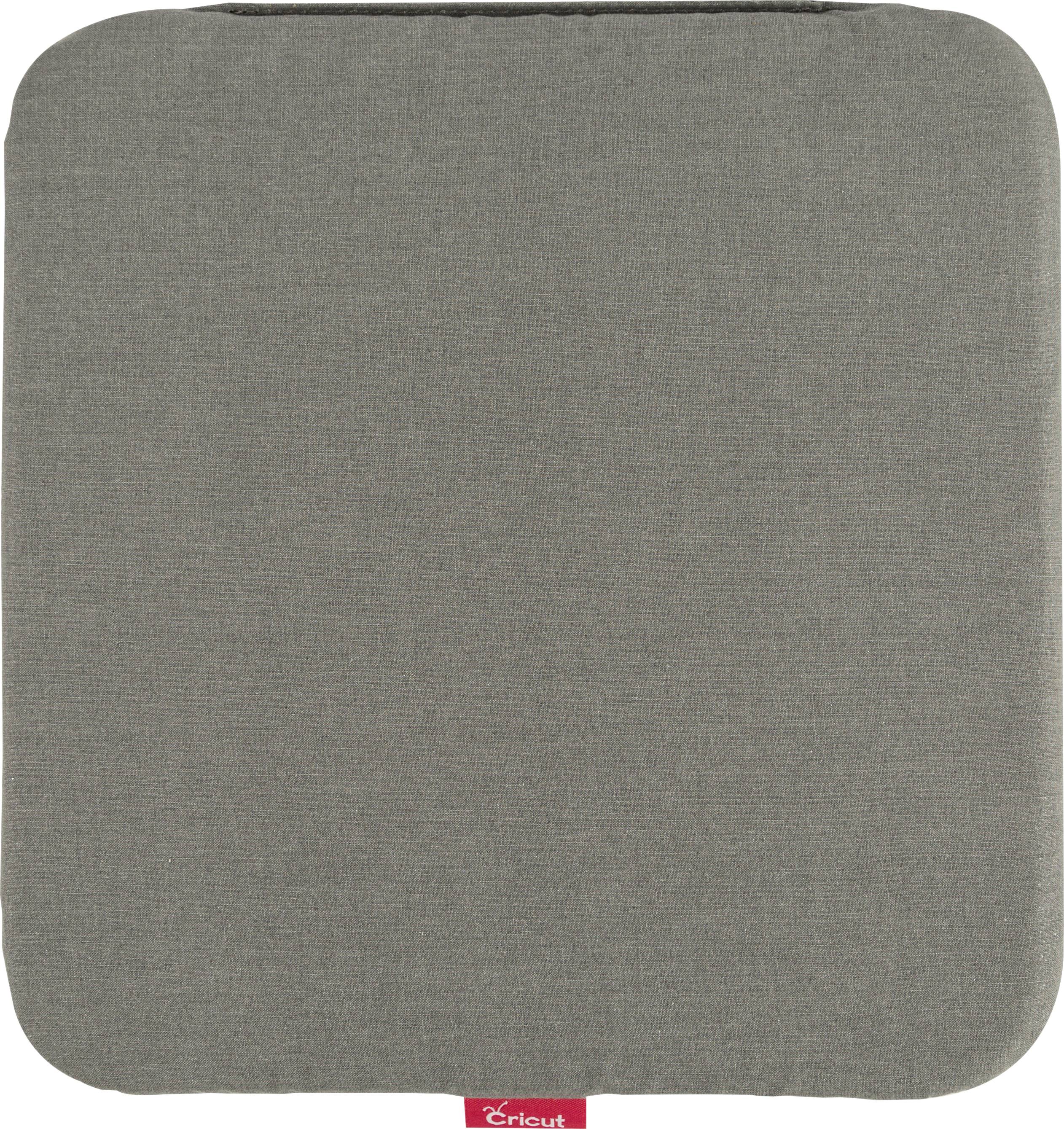 Grey square cushion with rounded corners, 'Cricut' brand label visible at the bottom in red.
