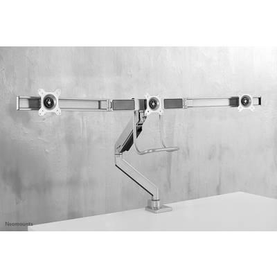 Metal monitor mount on a desk, suitable for three screens. Minimalist design, adjustable arms.