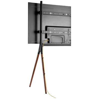 A flat television is mounted on an elegant, three-legged stand. A yellow cable hangs down neatly.