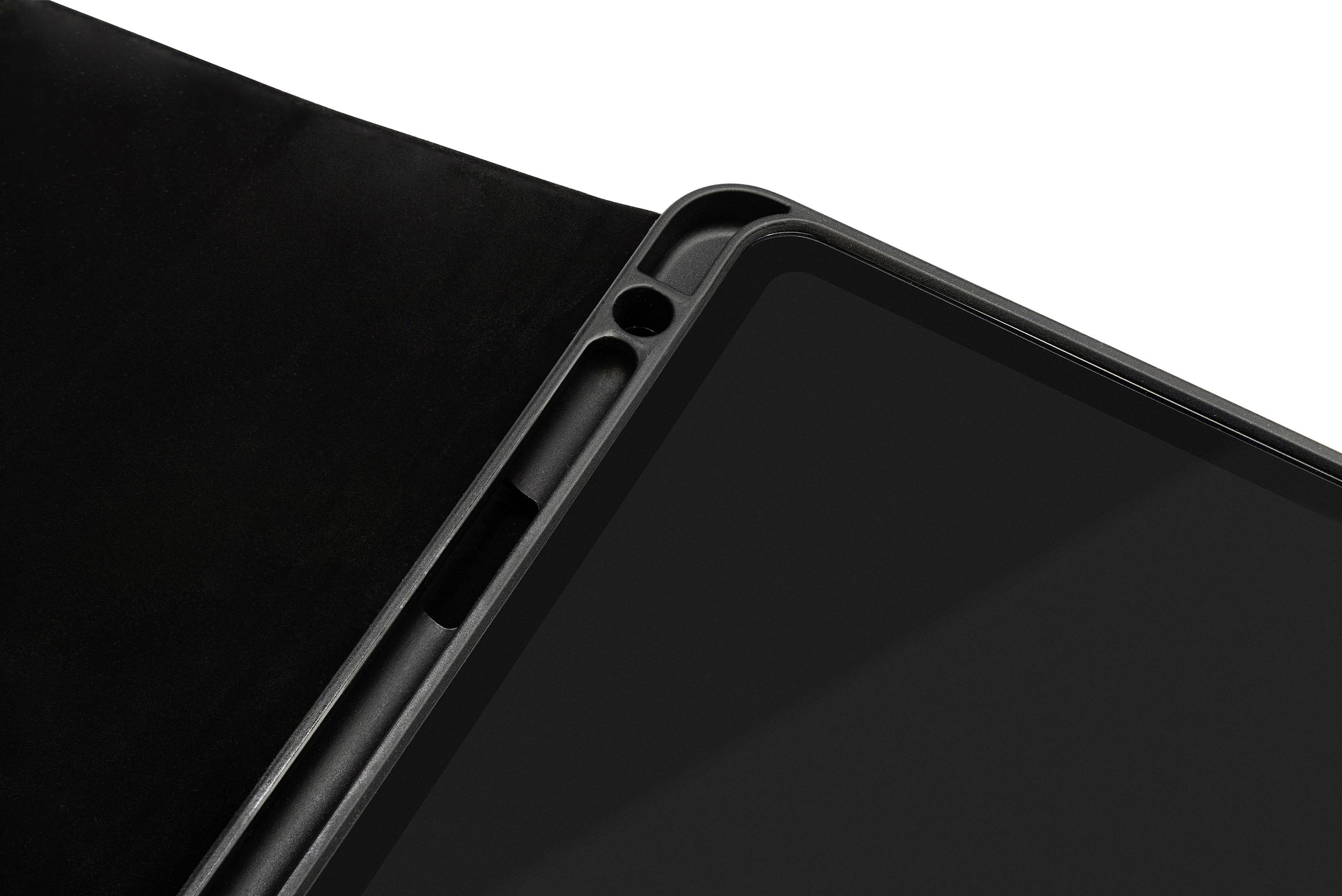 Close-up of a tablet in a case, partially open, with a black screen and camera hole.