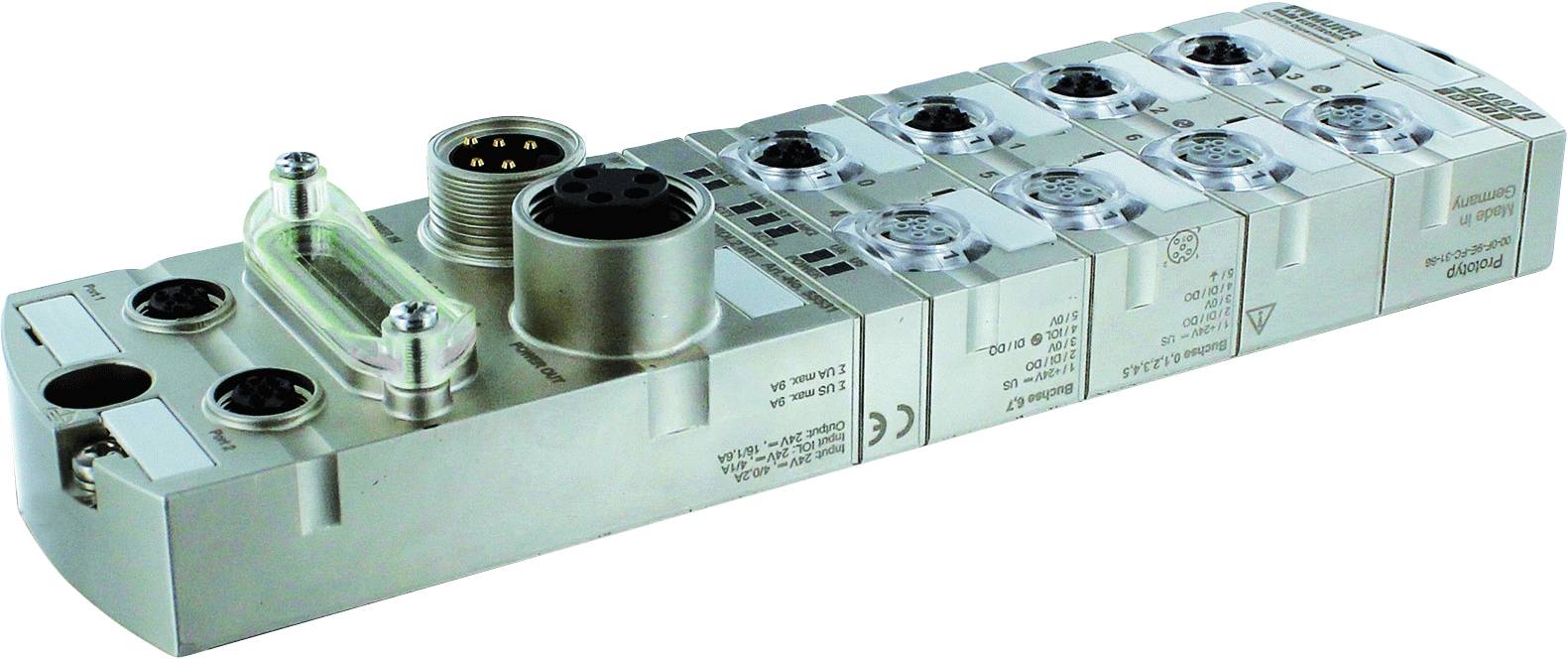 A silver industrial connection module with multiple round connectors and labels, used in automation systems.