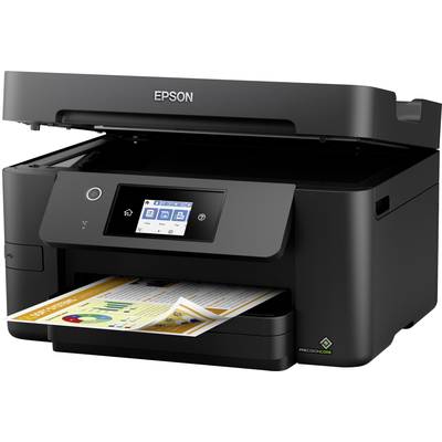 Black multifunction printer on a desk with a colourful graphic page printed out in the output tray; display shows menu options.