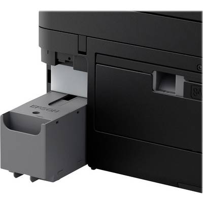 A grey paper output tray of a printer is partially pulled out. The printer is black. It appears to be a multifunction device.
