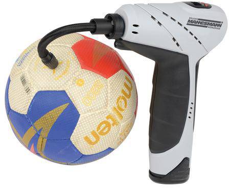 A hand pump inflates a colourful football. The pump is black and white, and the ball has blue and red patterns.