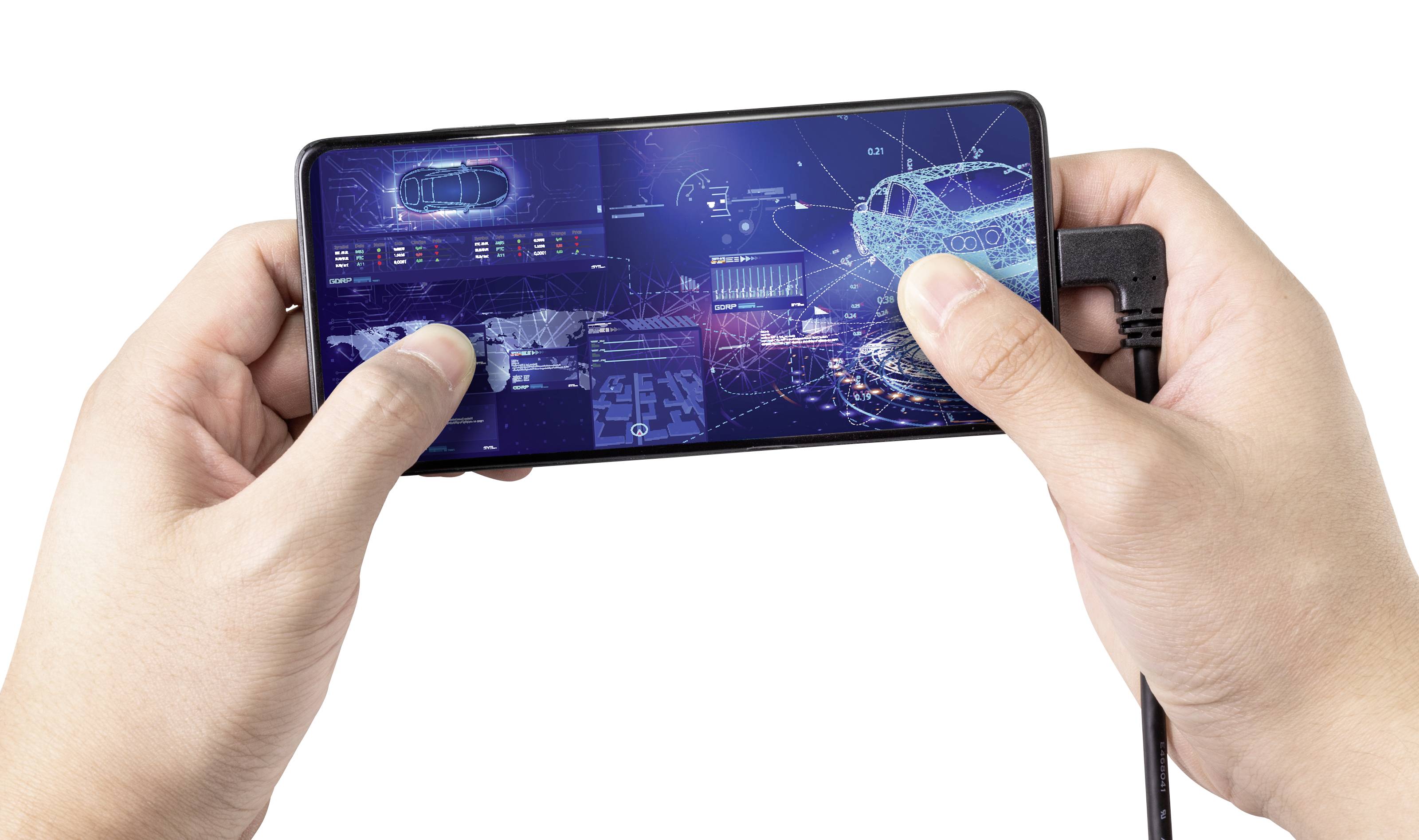 Two hands are holding a smartphone displaying a technical blueprint of automobile production on the screen. A cable is connected.