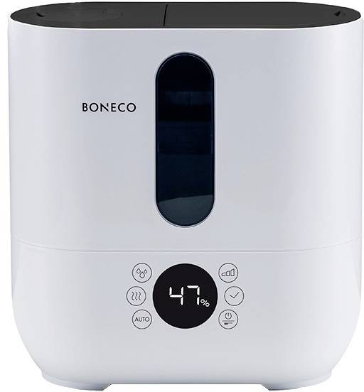 A white air humidifier with a digital display shows 47% humidity. Various control buttons are visible at the bottom.