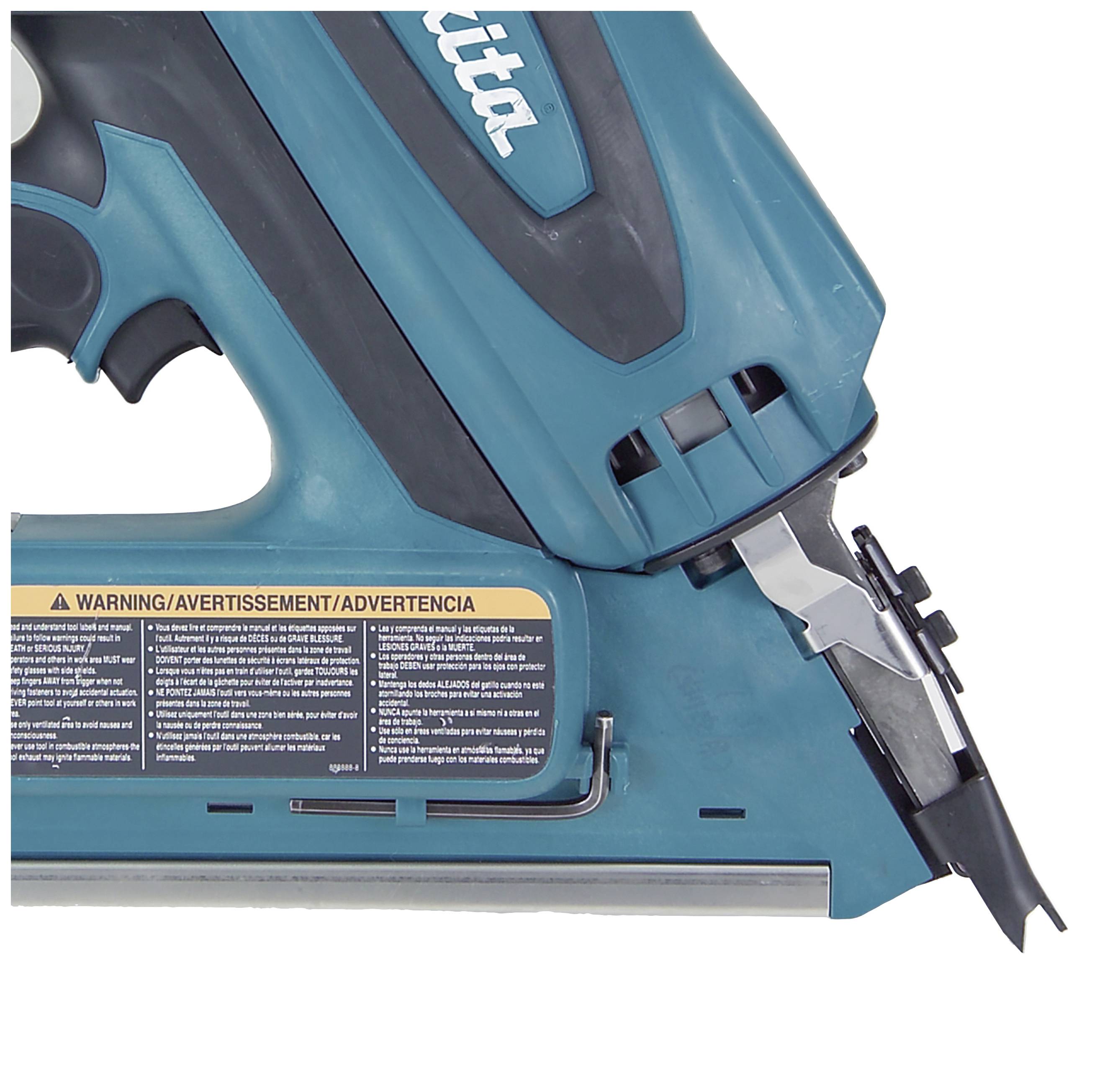 Electronic nail gun in close-up, blue, with warning labels on the side. Main switch and nail chamber are visible.