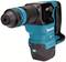 A blue and black hammer drill with an ergonomic handle and brand logo. Ideal for drilling into hard materials.