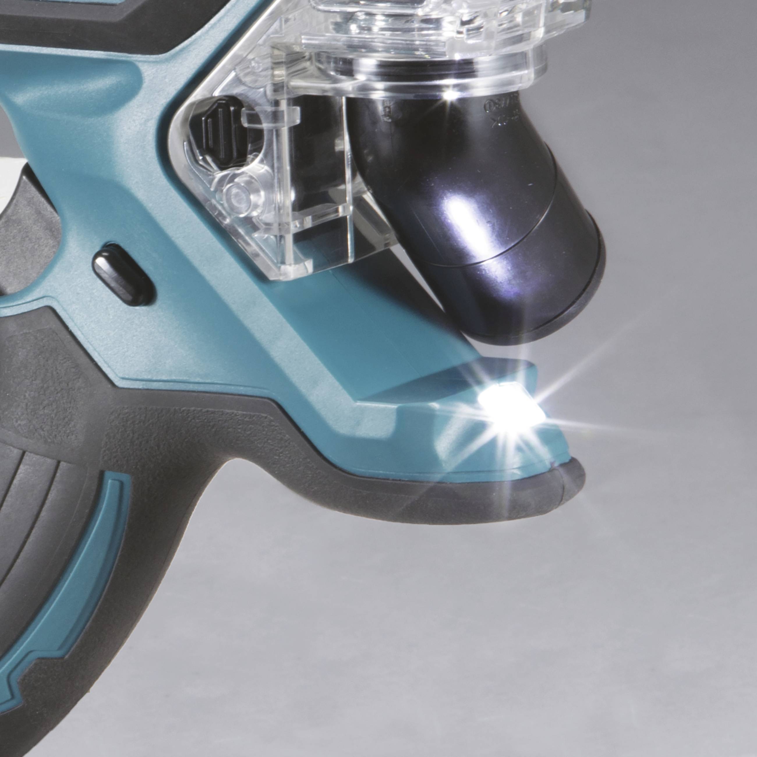 Close-up of an electric hand router with a blue handle. An LED lamp illuminates the work area.