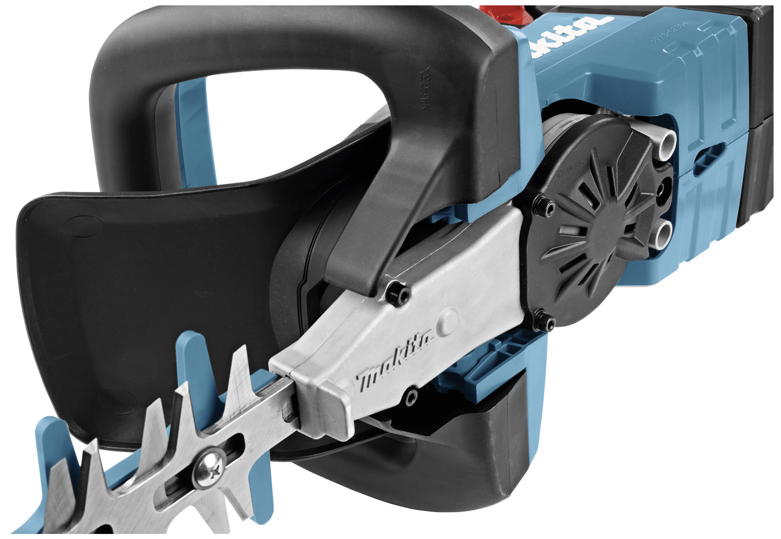 Close-up of an electric hedge trimmer, showing its sharp blades and robust construction.