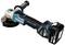 An angle grinder with a black handle and blue housing by the brand 'Makita', fitted with an abrasive disc and a battery compartment.