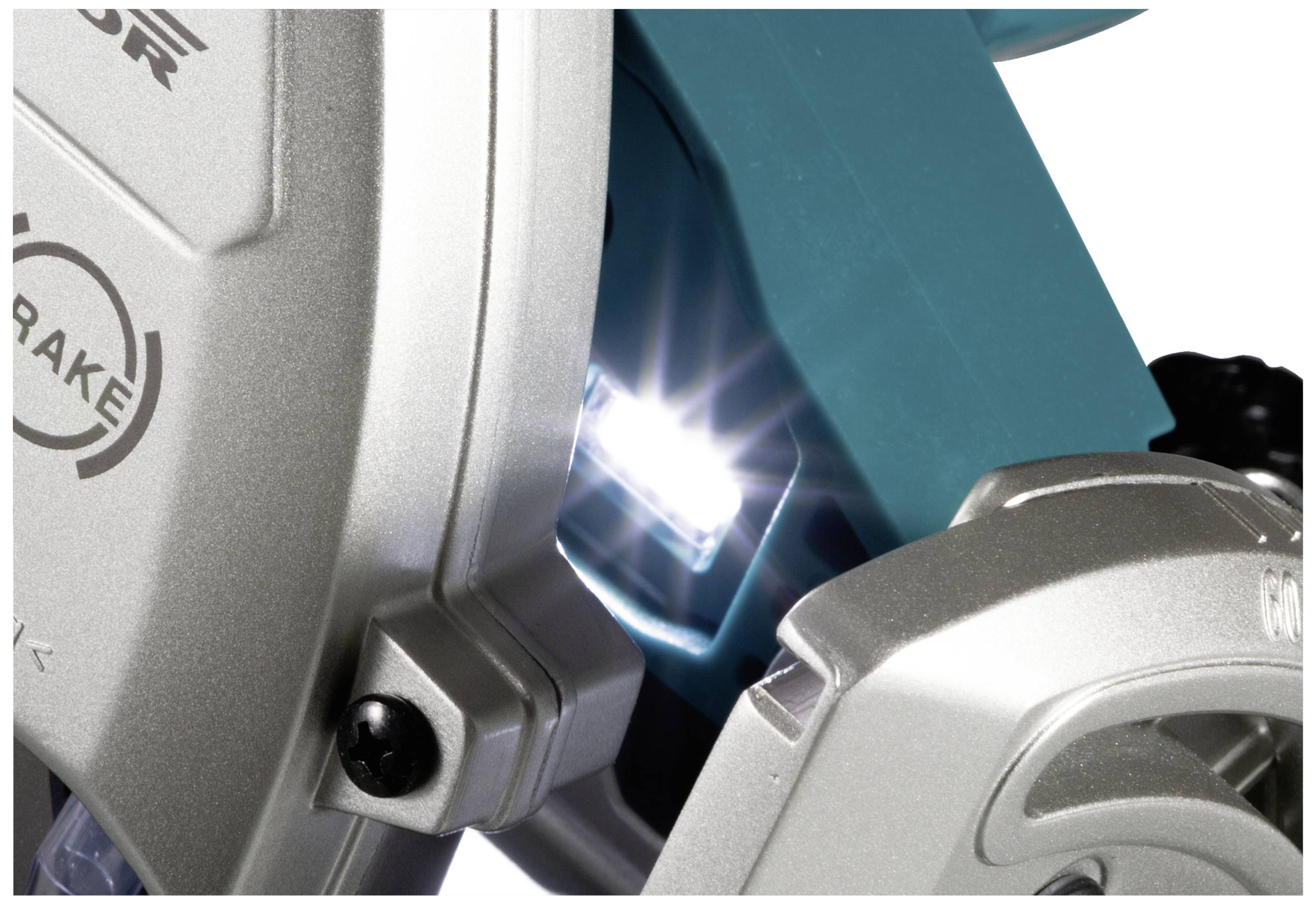 Close-up of a silver and blue power tool with an illuminating LED light that highlights the working area.