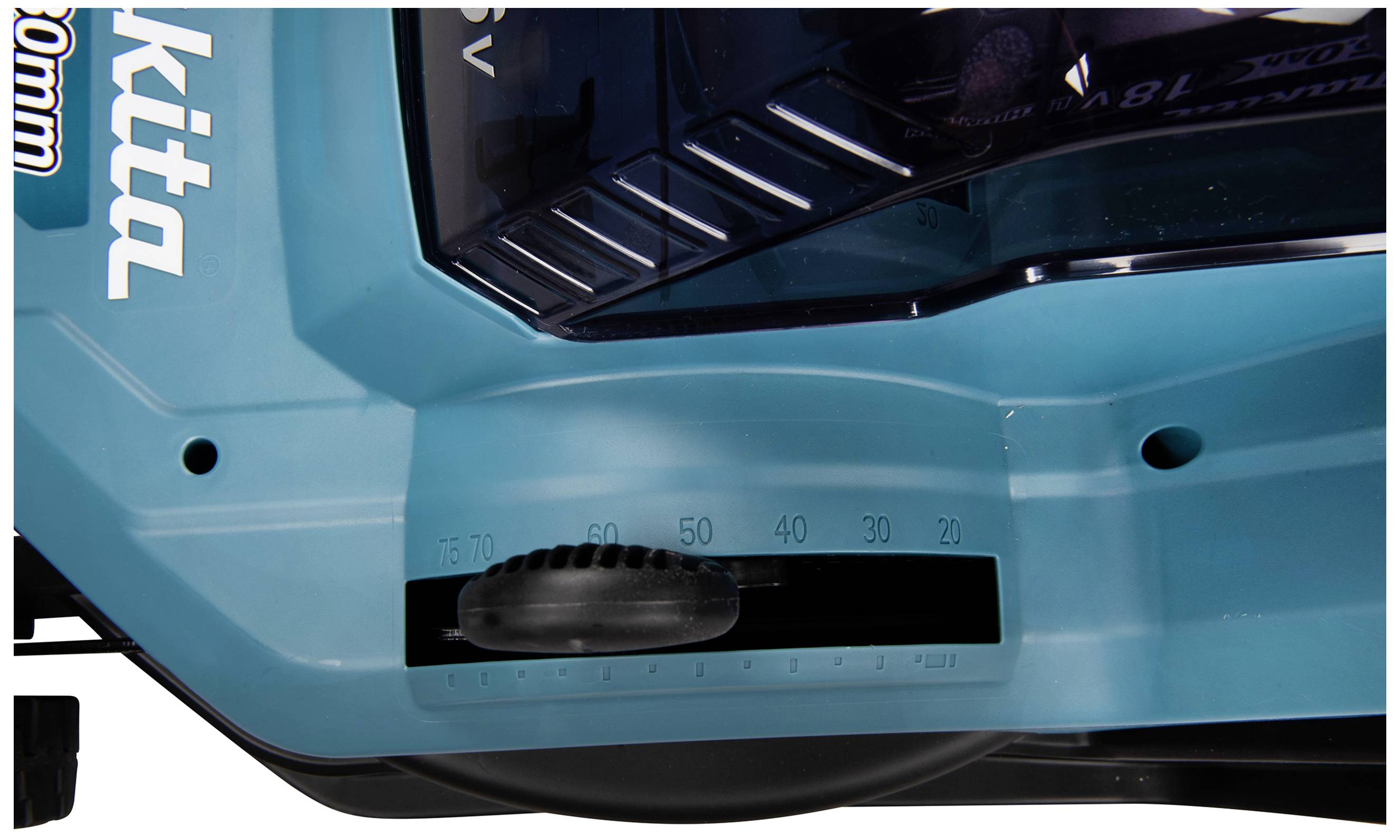 A close-up of a blue device with a scale ranging from 20 to 70, showing a rotary dial.