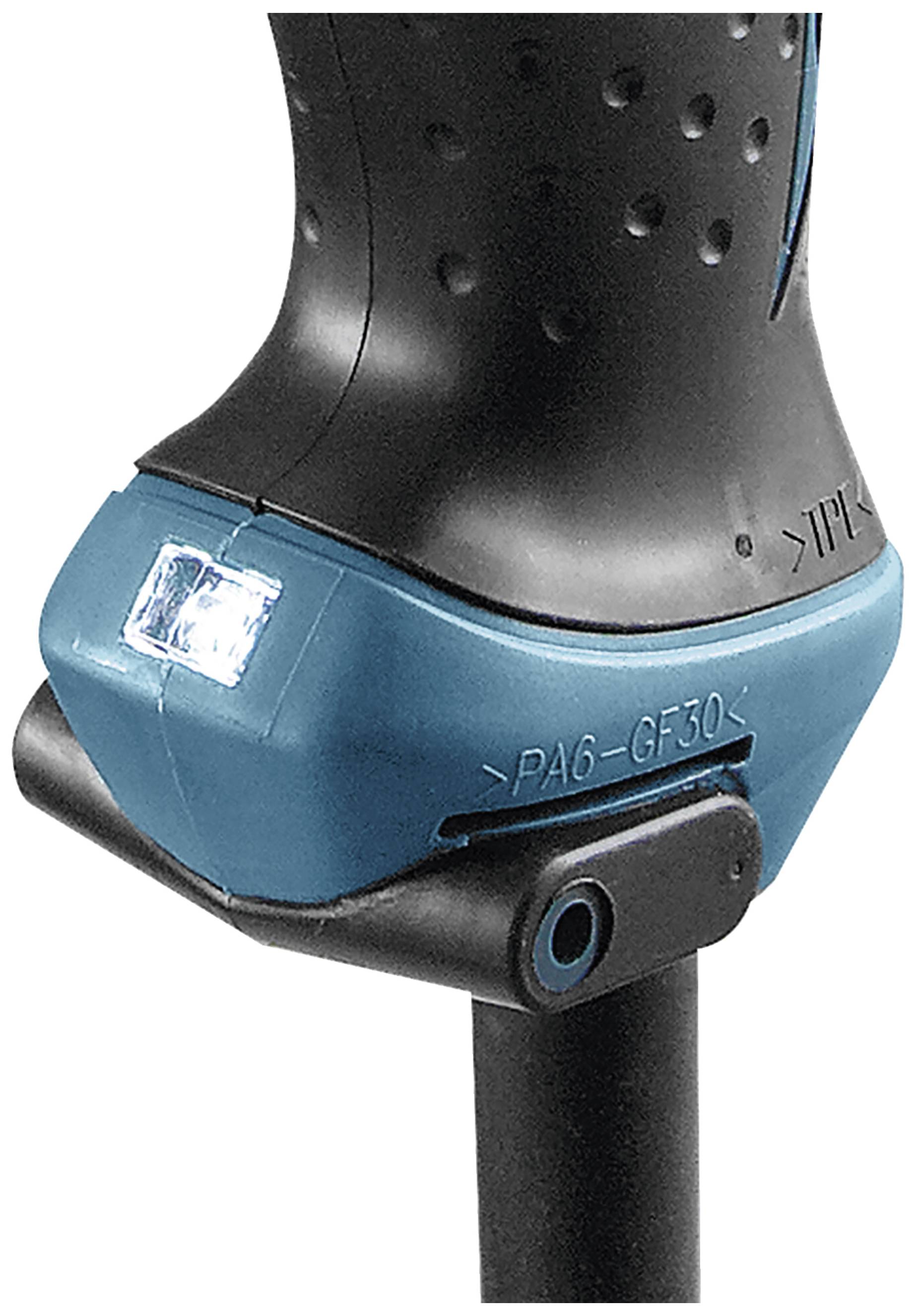 Close-up of a blue electric tool with a glowing LED lamp on its underside.