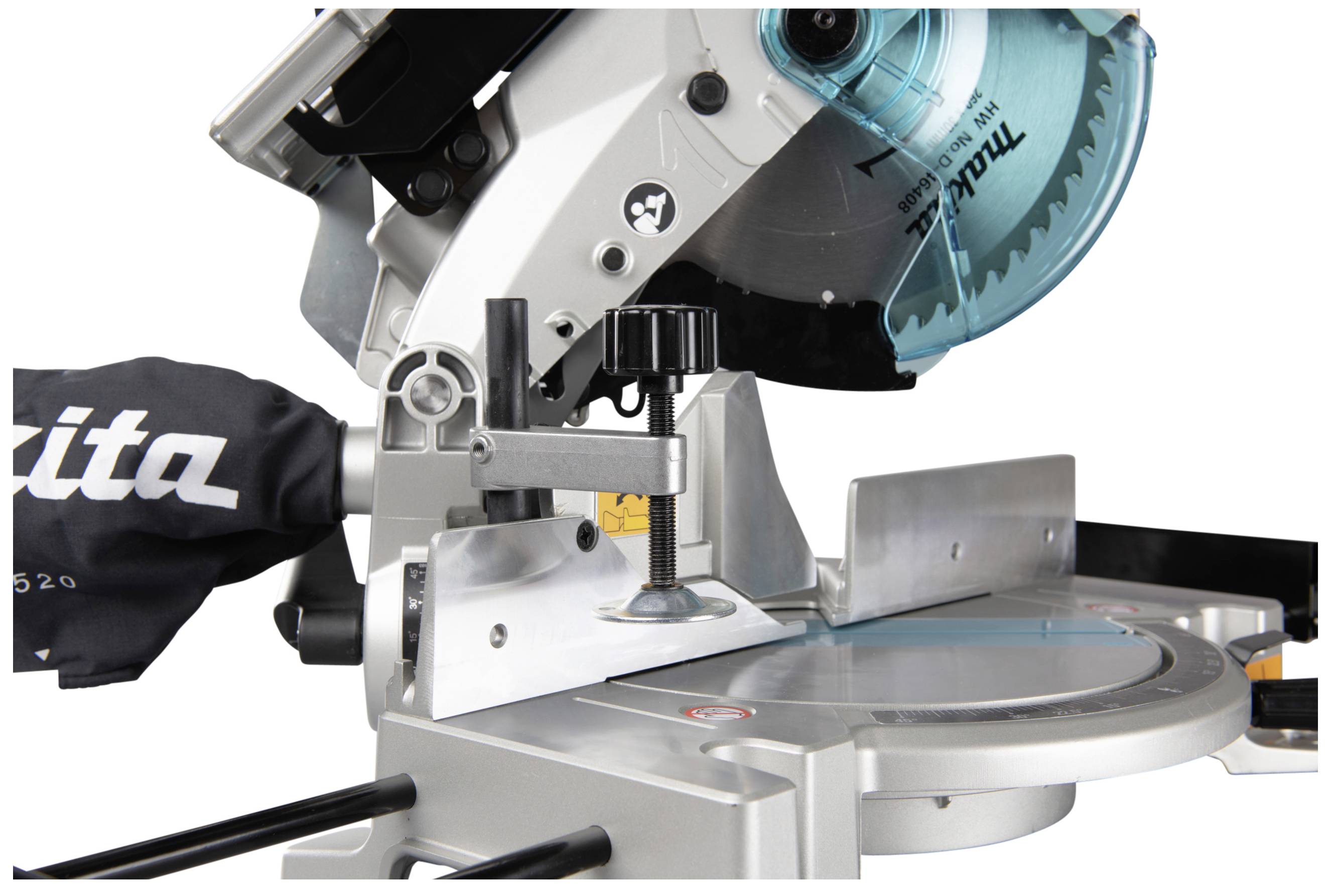 Electric mitre saw with blue blade in action; a metal piece being precisely cut. Always observe safety guidelines.