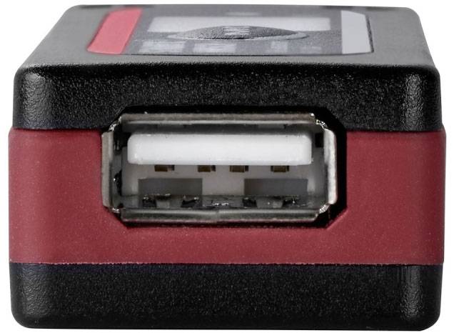 Black and red USB charger, photographed from the front, showing a USB port.