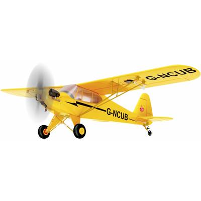 A yellow single-engine propeller aircraft with 'G-NCUB' marked on its wings and fuselage is hovering in the air.