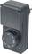 Black plug-in timer with a rotating dial and ON/OFF settings, used to control power on a wall outlet.