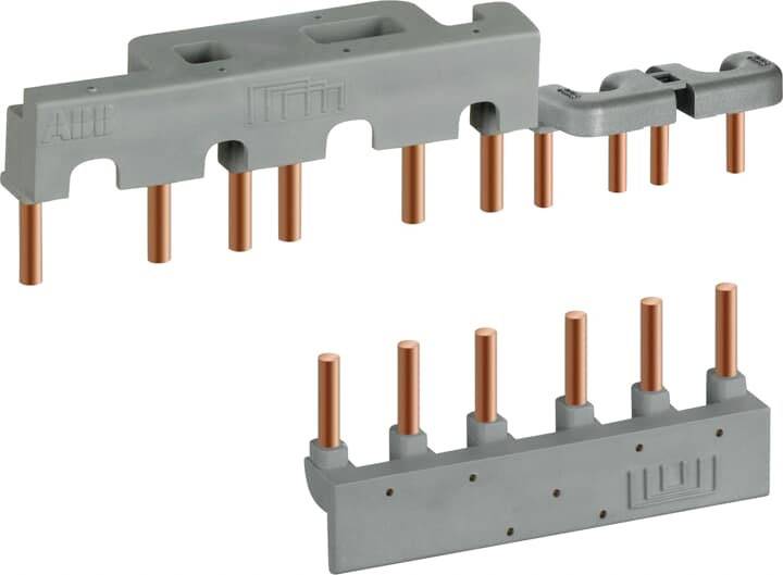 Electrical busbars in grey, with multiple copper pins. Upper section shows a module with nine pins, lower section with six pins.
