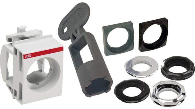 Components of a switch, including mounting brackets, a key, and various fixing rings in different colours and shapes.