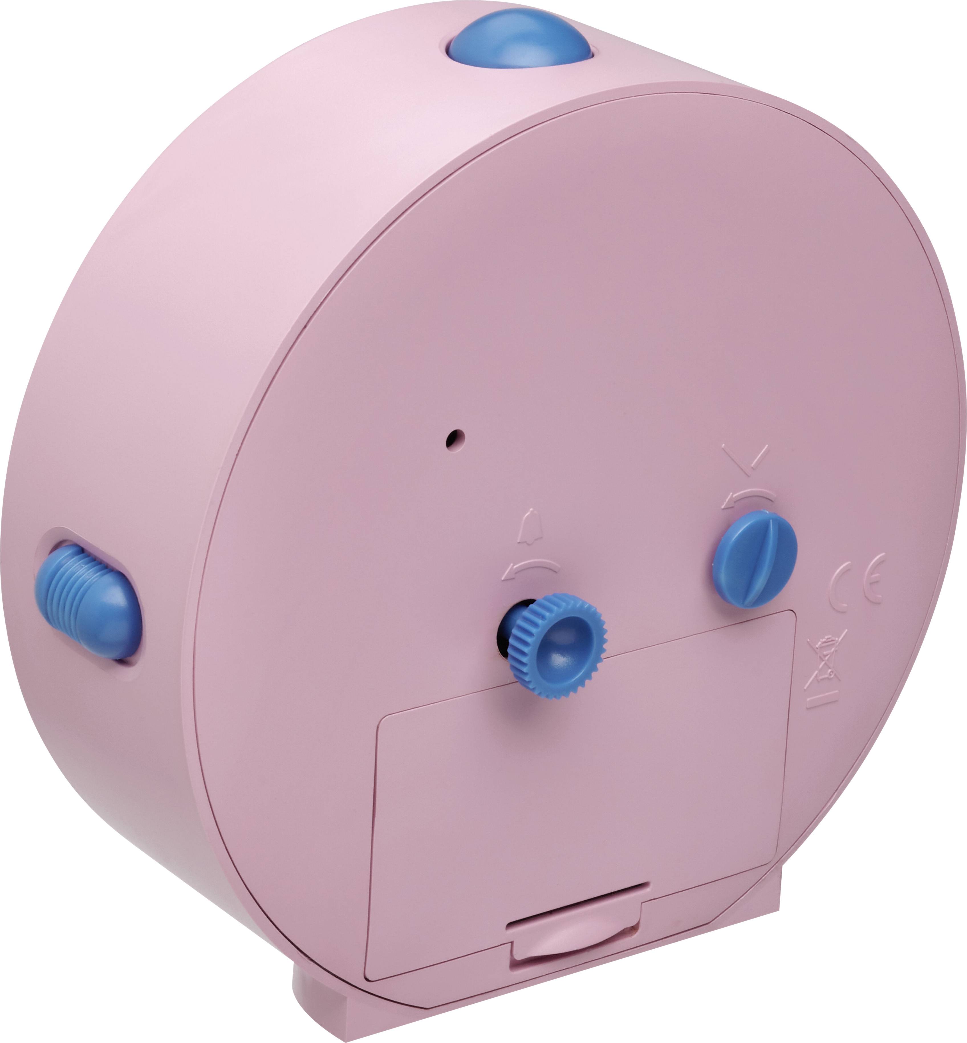 A pink device with blue buttons and switches, likely for technical or mechanical functions.