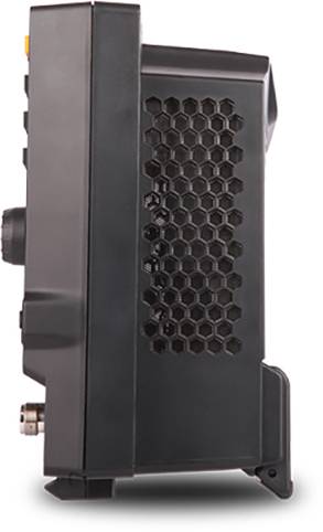 Side view of an electronic device with a honeycomb grill design, black casing and multiple connection points.