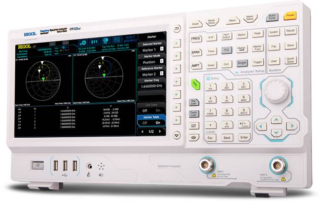 A spectrum analyser with a digital display shows two diagrams with data to perform frequency analyses. Control panel on the right.
