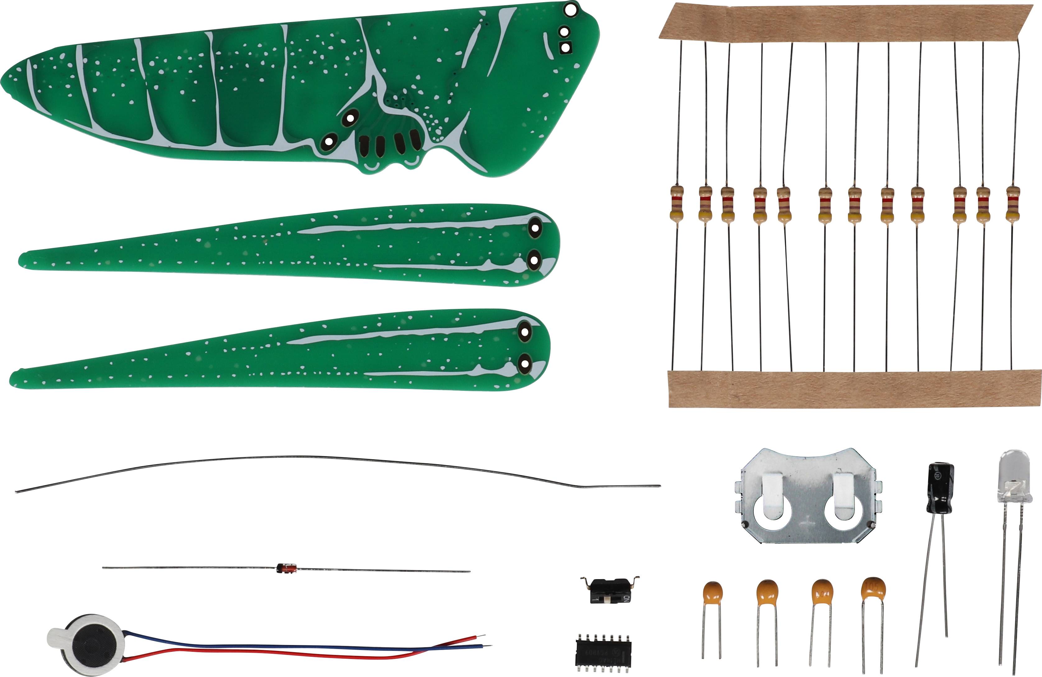 Electronic kit with a green circuit board in the shape of an animal, featuring various resistors, sensors, and other small electronic components.