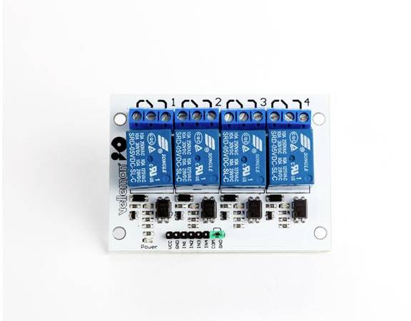 'Relay module with four blue relays on a white circuit board, numbered 1 to 4. LED indicator and terminal strip along the bottom edge.'