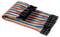Flat ribbon cable with coloured conductors and black connectors.