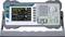 Programmable signal generator with digital display, keypad and rotary knobs for controlling frequency, amplitude and phase.