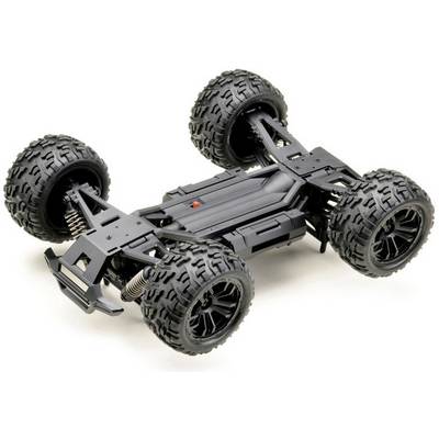 A black remote-controlled car without bodywork, showing robust tyres and suspension, suitable for off-road driving.