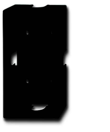A black, rectangular object with irregular edges and multiple recesses, potentially part of a larger system.