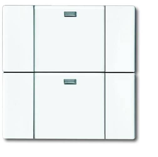 A white switch with double rectangular buttons in two rows, each with a small grey rectangle in the centre at the top.