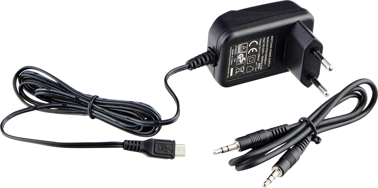 A power supply with a European plug and a long cable that terminates in a micro-USB connector. Beside it, a stereo audio cable with two jack plugs.
