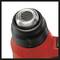 Red and black heat gun with metallic nozzle, close-up. Tool for DIY projects, suitable for paint removal.