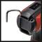 A close-up of a black and red electric power tool, possibly a cordless drill, with a hook at the top.