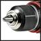 Close-up of a drill chuck with a centre point. It is made of metal and shows markings for sizes from 2–13 mm.