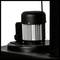 A black electric motor is mounted on a machine. The motor has a cylindrical, ribbed body and a robust cover.