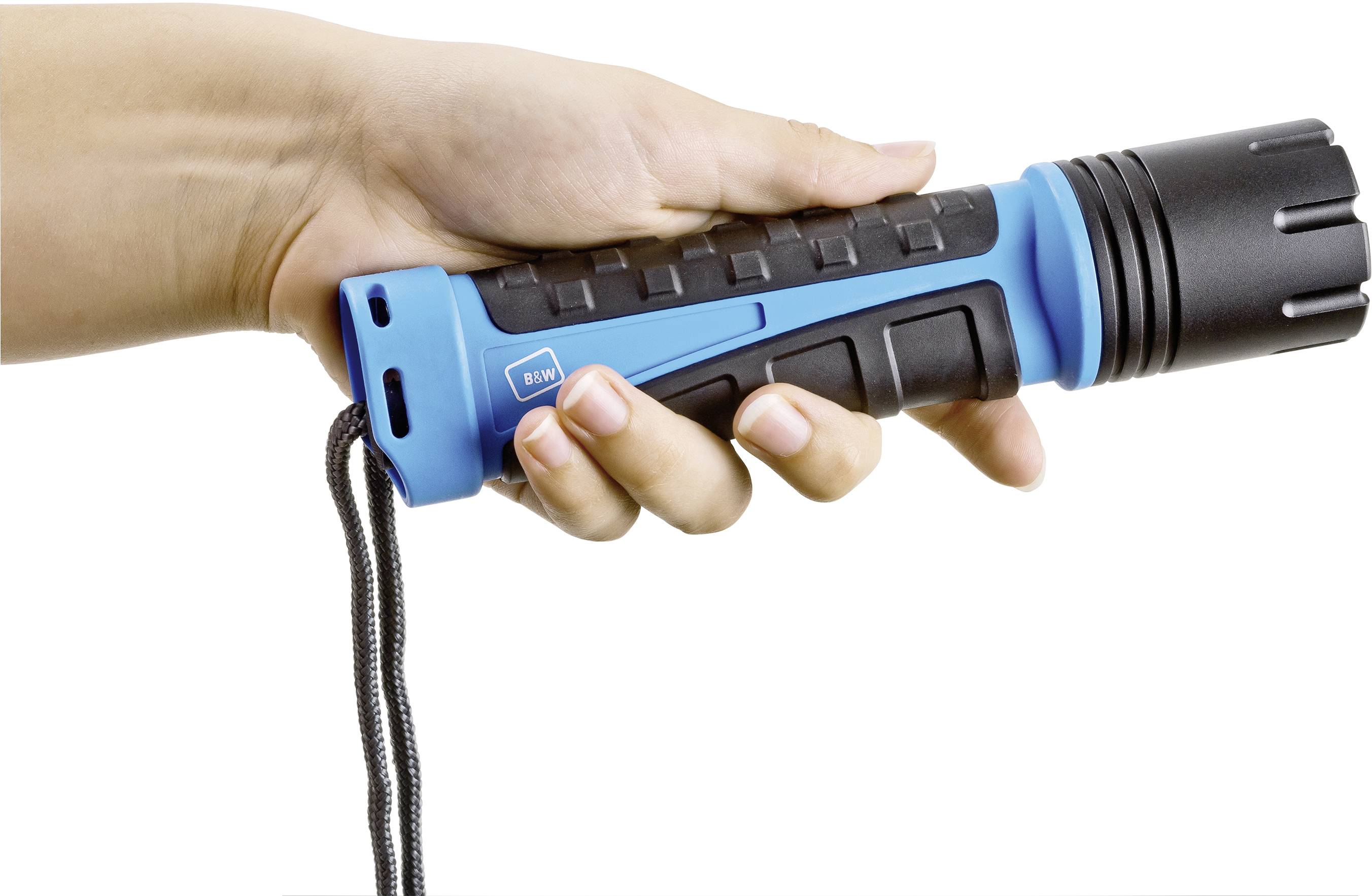 A hand is holding a blue and black torch with a lanyard, ready to be used.