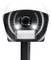 A black ultrasonic animal deterrent device with a central speaker and sensor, emits light.