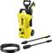 Pressure washer in yellow with two nozzle attachments and a black hose, perfect for cleaning exterior surfaces.