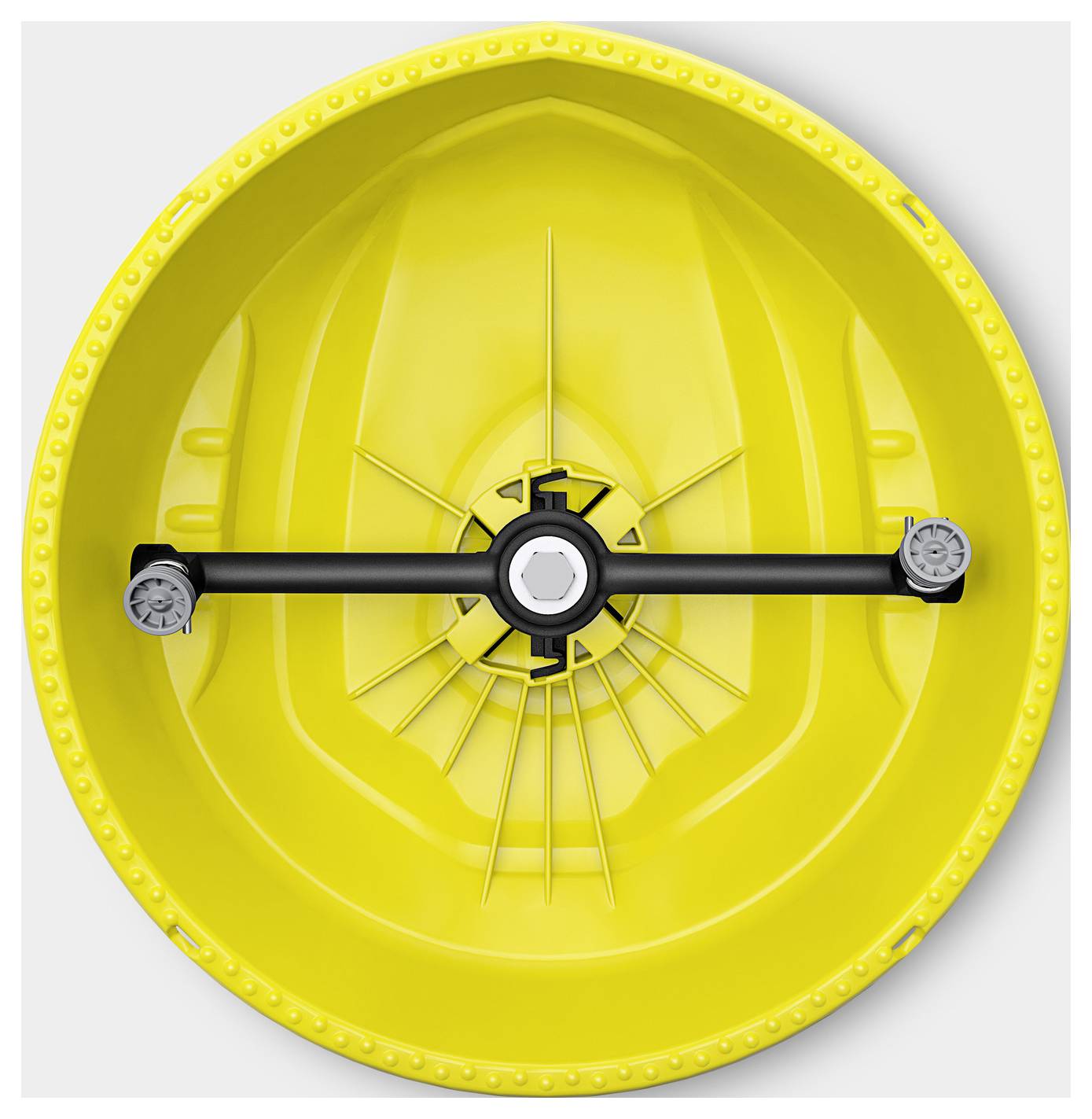 A yellow, round industrial machine part with mechanical components and a central black rod, viewed from above.