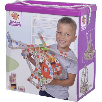 A child is holding an assembled model helicopter from an Eichhorn Constructor building set. The packaging displays the product.<br><br>Note: The translation uses British English terminology and maintains the original meaning and structure of the German text.