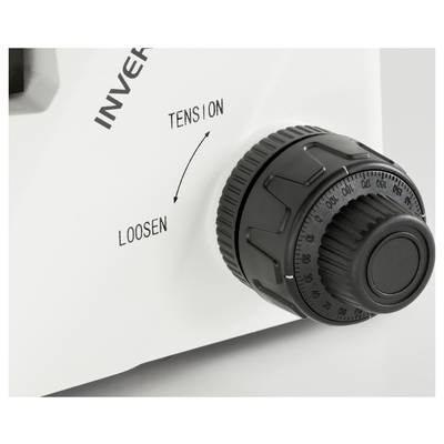 Close-up of a dial knob on a device. The knob is labelled with 'Tension' and 'Loosen', with an arrow indicating the direction of rotation.