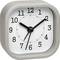 A square analogue clock with a grey frame displays 10:10.