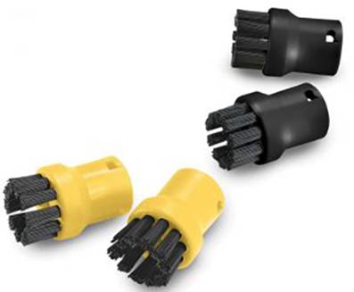 'The image shows four round cleaning brush attachments, two yellow and two black, lying in various positions.'