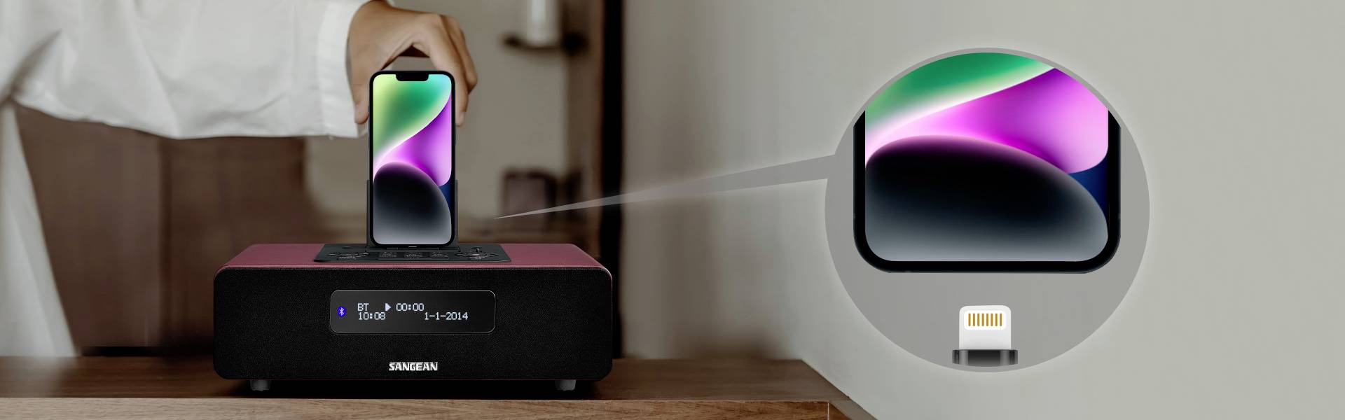 A person places their smartphone on a wireless charger. A close-up shows the connection point on the device. The charger's display indicates charging information.