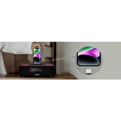 A person places their smartphone on a wireless charger. A close-up shows the connection point on the device. The charger's display indicates charging information.